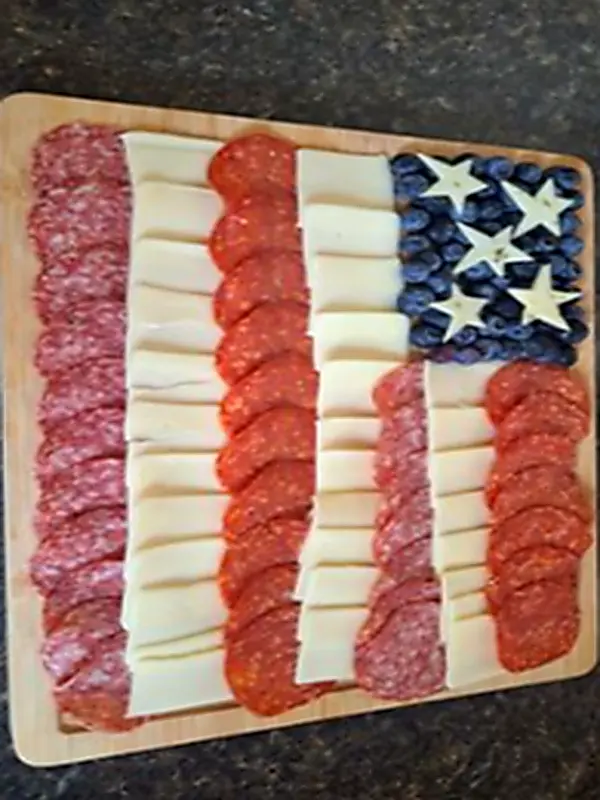 4th of July pool party inspiration — friends celebrating with red white and blue