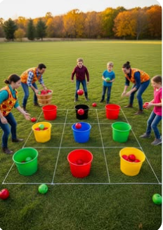 Colorful bucket toss game set up on grass field