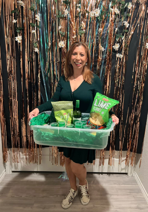 Real Rep Your Color Party — woman in green holding matching color basket of snacks