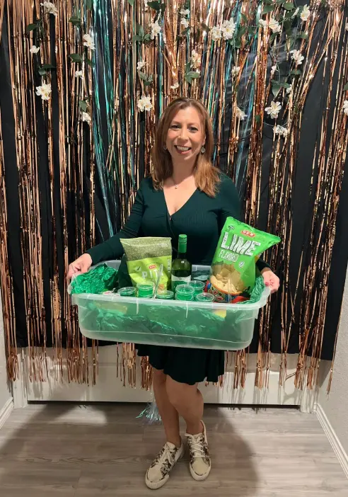Real Rep Your Color Party — woman in green holding matching color basket of snacks