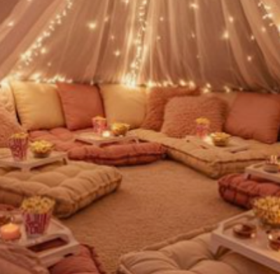 Floor pillow setup with fairy lights and warm glow for an intimate gathering