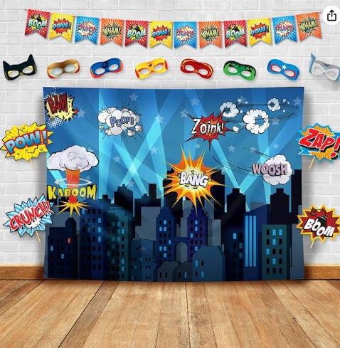 Superhero cityscape photo booth backdrop with comic props banner and masks