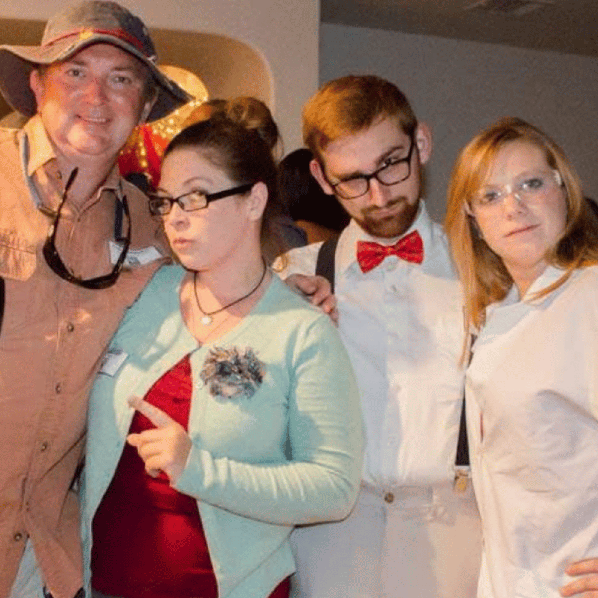 Real murder mystery party — guests in costume posing in character