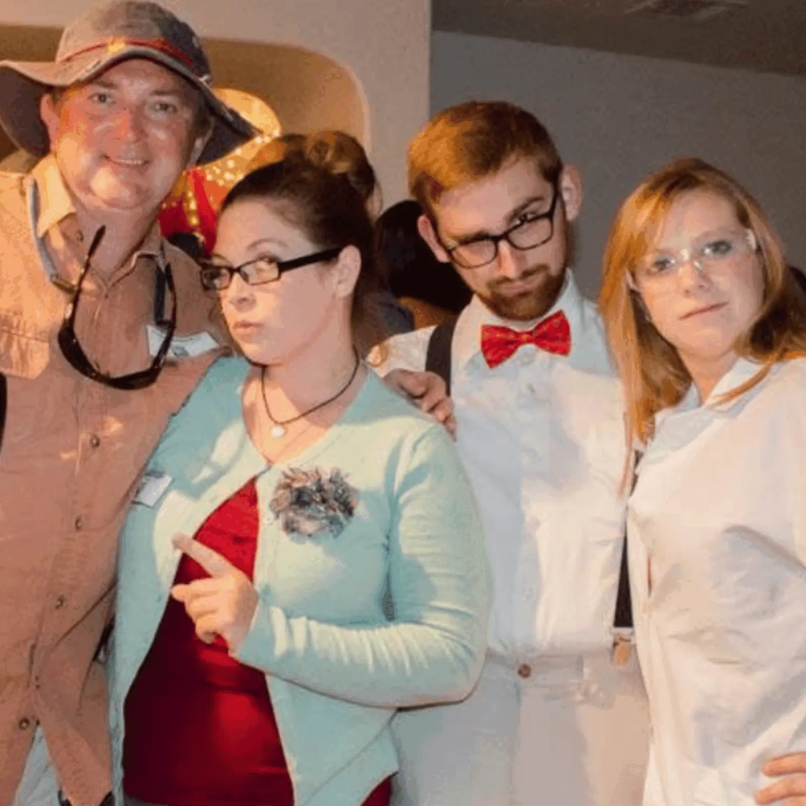 Real murder mystery party — guests in costume posing in character