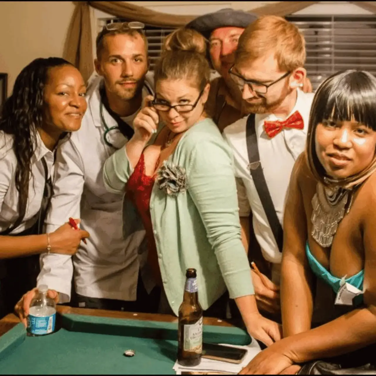 Real murder mystery party — group of costumed players gathered around the clue table