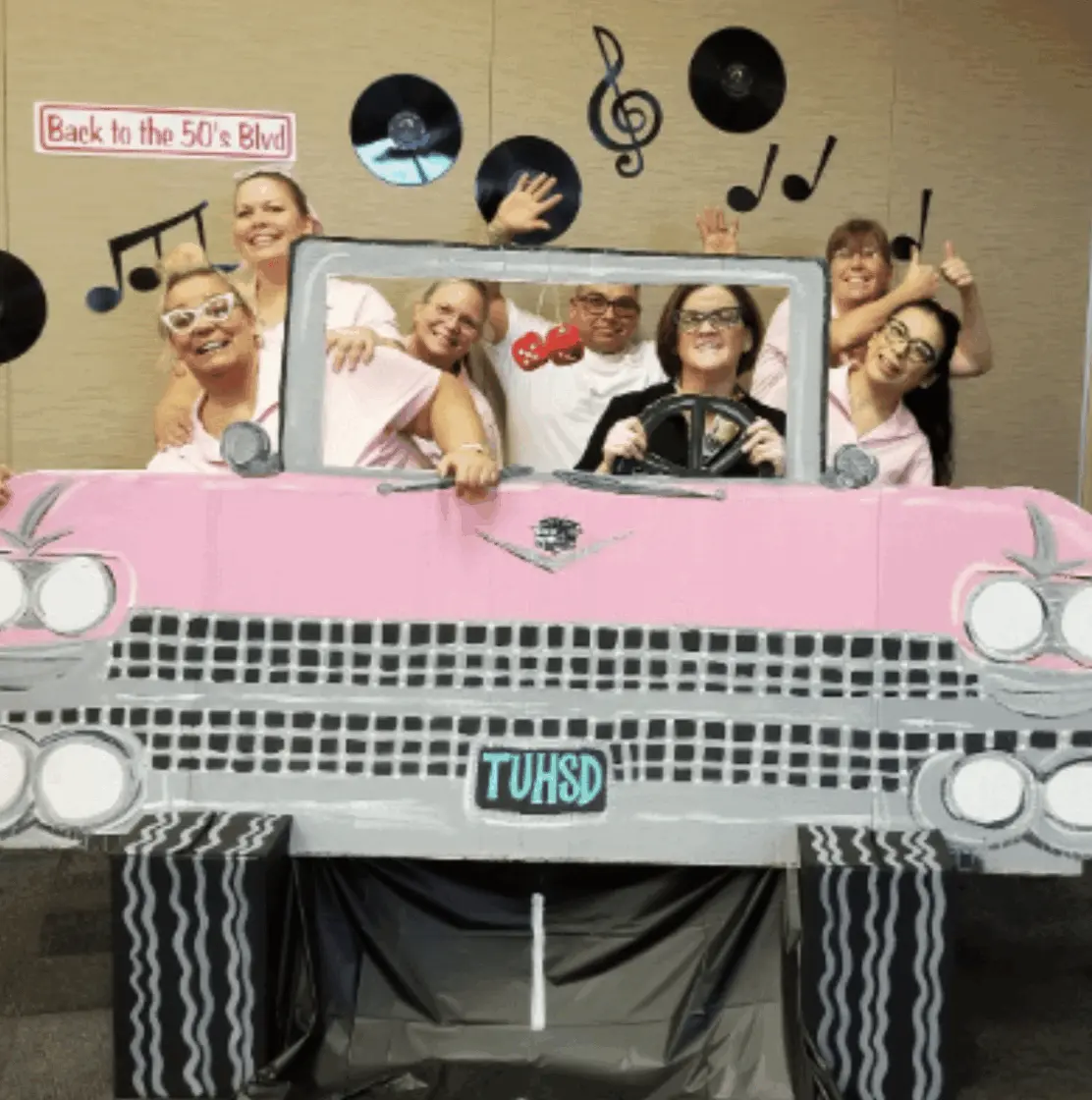 Sock Hop party — three friends in retro TV frame photo prop
